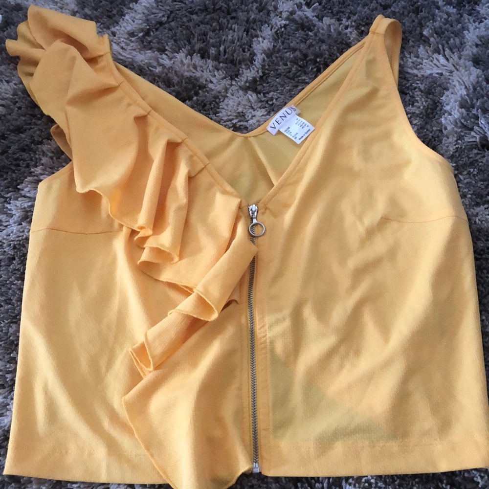 A yellow zip up venus shirt